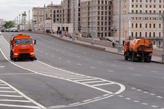 Bolshoy Moskvoretsky Bridge in Moscow with street cleaning vehicles