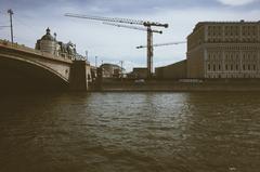 Bolshoy Moskvoretsky Bridge and Sofiyskaya Embankment with the construction site of Tsaryov Sad business center in Moscow