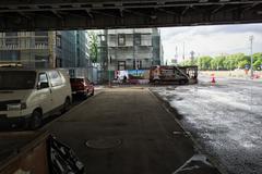 Raushskaya embankment view from under Bolshoy Ustyinsky Bridge towards Balchug Residence construction