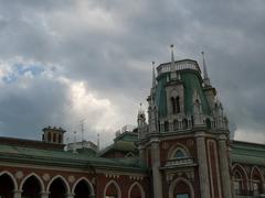 Stunning view of an elegant historic palace with lush greenery in the foreground