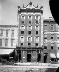 Historic view of Briggs Hardware, Macabbee Club, Bridgers Tailor on Fayetteville Street, Raleigh, NC, circa 1900-1915