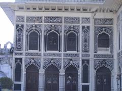 Urdu engravings on the black walls of the Imambara in Lucknow