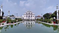 Chota Imambara in Lucknow with lush gardens and reflections in the water