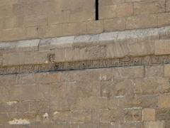 Kufic inscription carved in stone at Bab al-Futuh