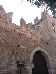 Casa di Romeo in Verona with crenellated walls and Gothic door