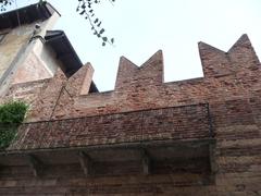 Casa di Romeo in Verona with crenellated walls and Gothic door