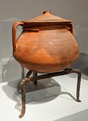 Ancient Roman caccabus cooking pot on a tripod