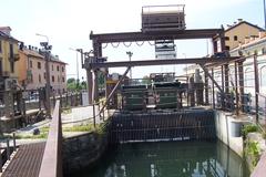 Naviglio Pavese canal with Conca Fallata and hydroelectric power station in Milan