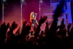 Maisie Peters performing on stage at Hollywood Palladium