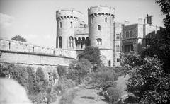 Windsor Castle in 1938, view of the castle with its majestic towers and battlements, surrounded by manicured lawns