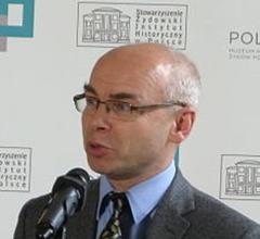 Professor Dariusz Stola speaks at a press conference