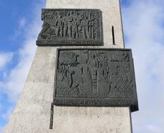 Bronze picture plates on World War II victory monument