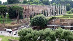 A sunny day at the Colosseum in Rome with tourists walking around