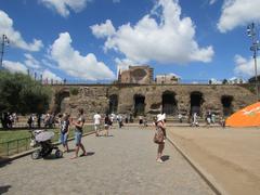 Imperial Forums in Rome with historic ruins and tourists