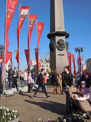 Victory Day parade in Saint Petersburg with participants holding portraits of their ancestors