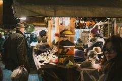 Christmas markets of Trento with festive decorations and lights in the evening