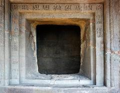 Detailed decorations around a window at Aurangabad Caves