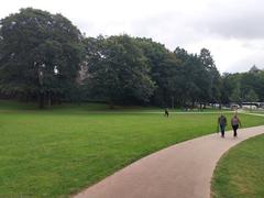 gate in Alter Elbpark with trees and cloudy sky