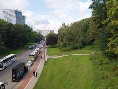 Alter Elbpark in Hamburg with green trees and historic Bismarck Monument