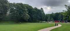 Alter Elbpark Hamburg scenic view with trees and statue