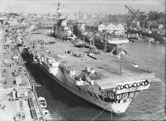 Royal Navy HMS INDEFATIGABLE aircraft carrier at wharf in Woolloomooloo, 1946