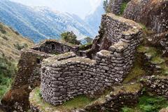 Phuyu Pata Marca ruins on the Inca Trail in Peru surrounded by mountains