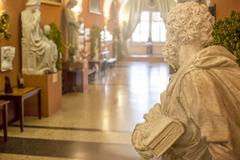 Corridor with historical sculptures at the Museum of Charles Bridge