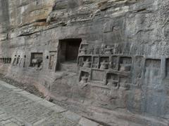 Defaced damaged rock-cut Shiva linga carvings at Gwalior Fort