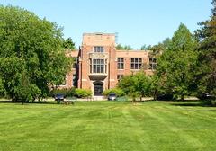 Campus grounds with pathways, buildings, and trees