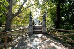 Photo of an Italian cultural heritage monument with a small bridge and the sun