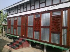 Corrugated iron house in Sreenagar Upazila