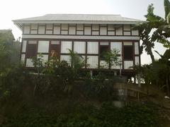 Corrugated iron house with brick foundation in Sreenagar Upazila, Munshiganj