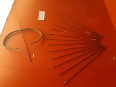 18th century wooden and iron bows and arrows