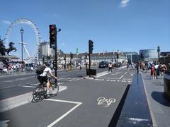 Cycle superhighway on Westminster Bridge with cyclists and pedestrians