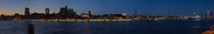 Panoramic view of Landungsbrücken in Hamburg during the evening