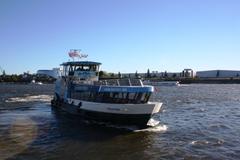 Hadag ferry Oevelgoenne in front of Hamburg Landungsbrücken