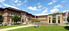 Museum Kunstpalast Ehrenhof with central fountain and Johannes Brus' bronze rhinoceros sculpture