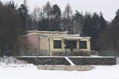 Empty Brněnská dam with a house