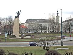 Monument of Warsaw's Heroes - Warsaw Nike on Theatre Square with Jablonowskich Palace in the background