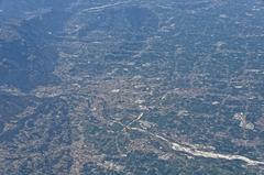 Aerial view of an airplane wing over clouds during a flight from Rome to Düsseldorf and Hamburg in 2013