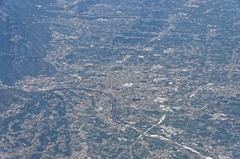 Aerial view of an airplane wing and clouds