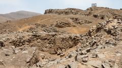 Huaca El Paraíso ancient archaeological site with mounds and walls awaiting excavation