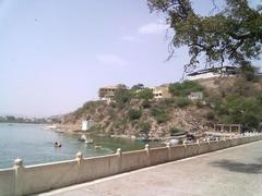 Anasagar Lake with a scenic view of water and mountains