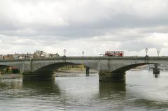 Putney Bridge with rowing boats on the Thames River