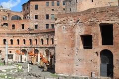 Forum Romanum in Rome with ancient ruins under a blue sky