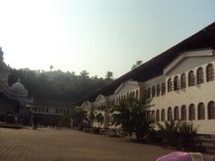 Front view of Mangueshi Temple with its elegant architecture and garden