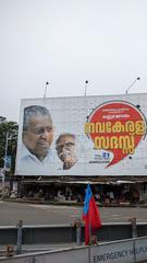 Kannur town street view with buildings and vehicles