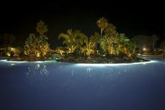 a stunning night view of Parque Marítimo del Mediterráneo in Ceuta