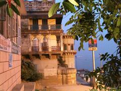 Panoramic view of Assi Ghat with boats on the Ganges River