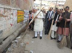 PM Modi during a cleanliness drive at Assi Ghat, Varanasi